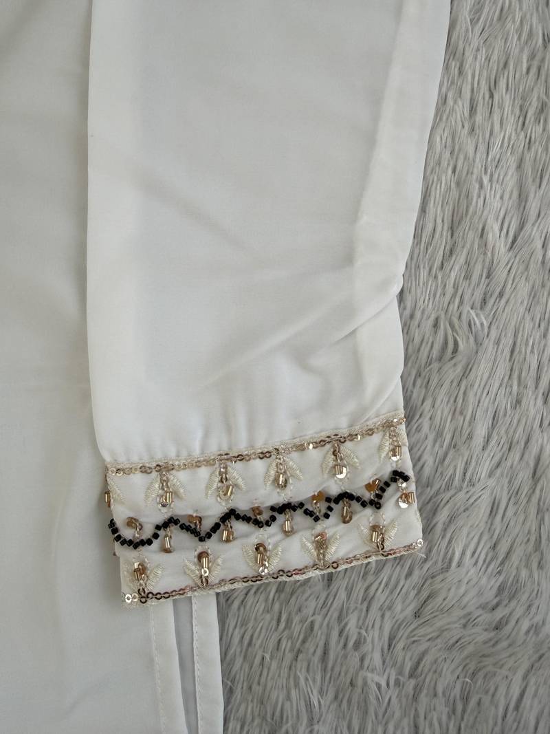 Off white silk blend heavy thread & sequins embroidered kurta with straight pant
