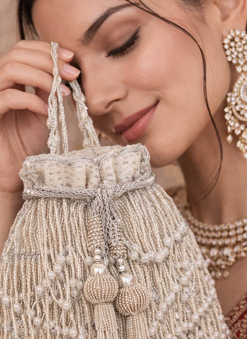 Silver ivory silk fringe potli bag
