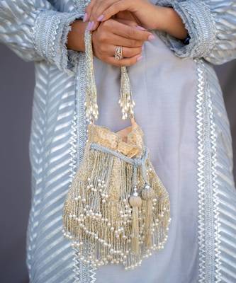 Silver ivory silk fringe potli bag 3