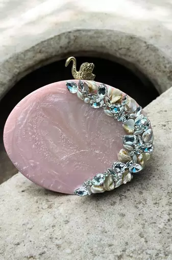 Blush pink rexine oval clutch