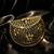 Metallic gold beaded mosaic clutch