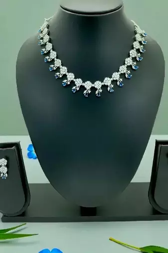 Royal blue american diamond necklace set with adjustable bracelet for women and girls.