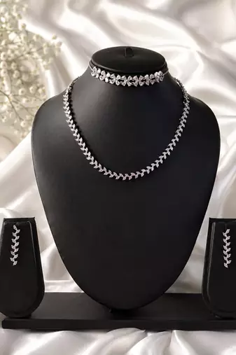 Dainty dew american diamond necklace set with adjustable bracelet for women and girls.
