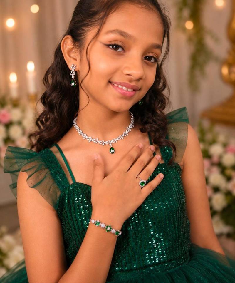 Green american diamond necklace set with adjustable bracelet and ring for women and girls.
