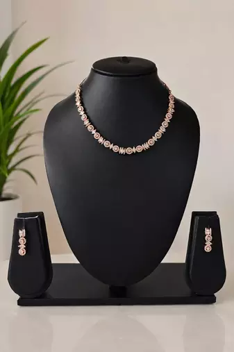 Regal radiance rose gold plated american diamond necklace set for women and girls.