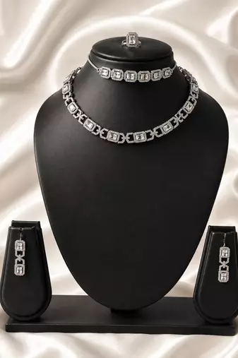 Silver american diamond necklace set with adjustable bracelet for women and girls.
