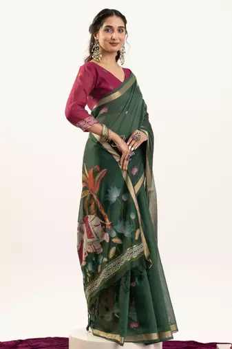 Bottle green soft muga cotton zari woven saree with blouse