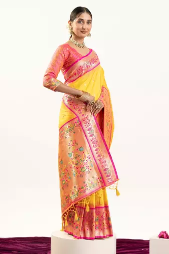 Yellow soft banarasi silk zari woven saree with blouse