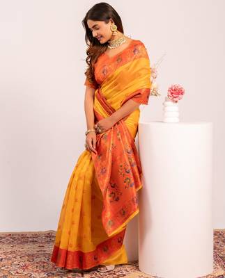 Women's yellow soft tissue silk zari woven saree with blouse 2