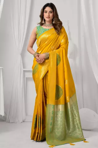 Women's yellow soft silk zari woven saree with blouse