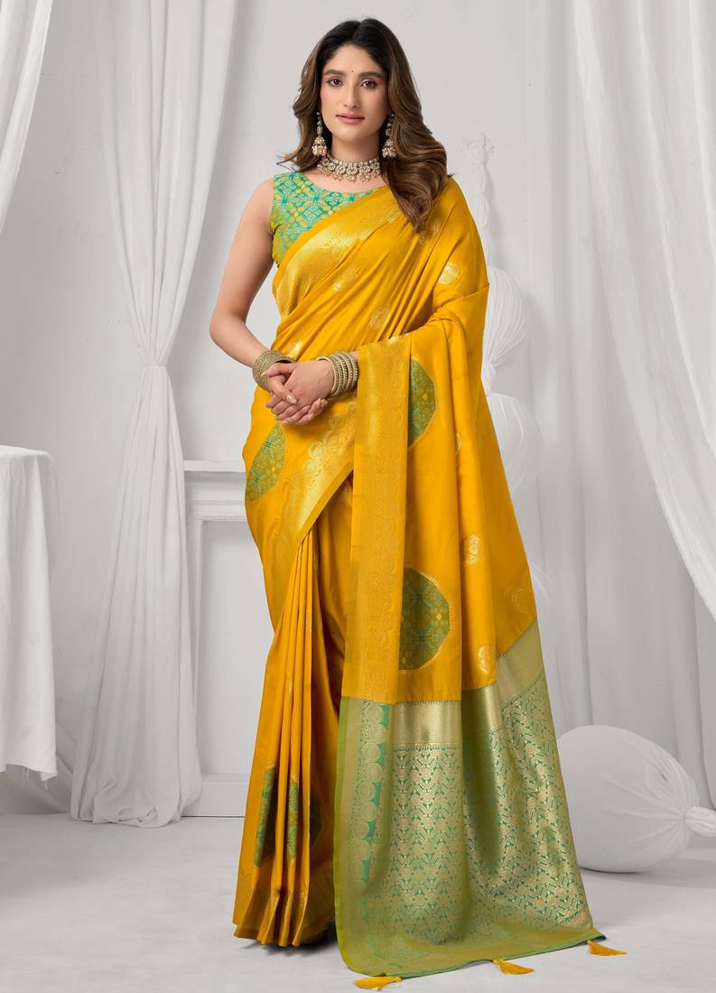 Women's yellow soft silk zari woven saree with blouse