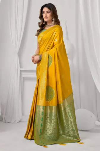 Women's yellow soft silk zari woven saree with blouse