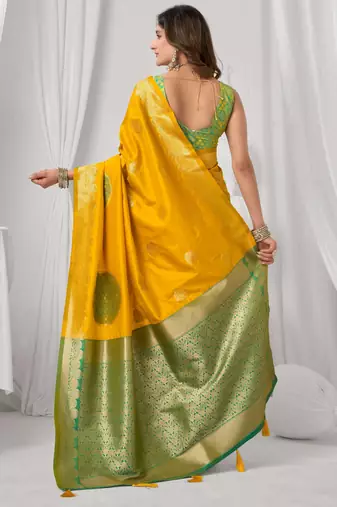 Women's yellow soft silk zari woven saree with blouse