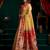 Women's mustard tissue paithani zari woven saree with blouse