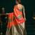 Women's orange soft silk zari woven saree with blouse