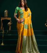 Women's yellow soft silk zari woven saree with blouse
