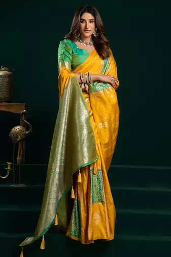 Women's yellow soft silk zari woven saree with blouse