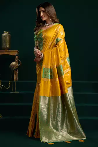 Women's yellow soft silk zari woven saree with blouse