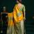 Women's yellow soft silk zari woven saree with blouse