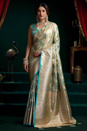 Women's turquoise satin silk zari woven saree with blouse