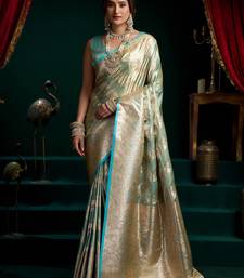 Women's turquoise satin silk zari woven saree with blouse