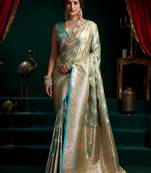 Women's turquoise satin silk zari woven saree with blouse