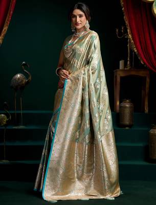 Women's turquoise satin silk zari woven saree with blouse 3