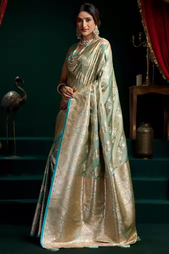 Women's turquoise satin silk zari woven saree with blouse