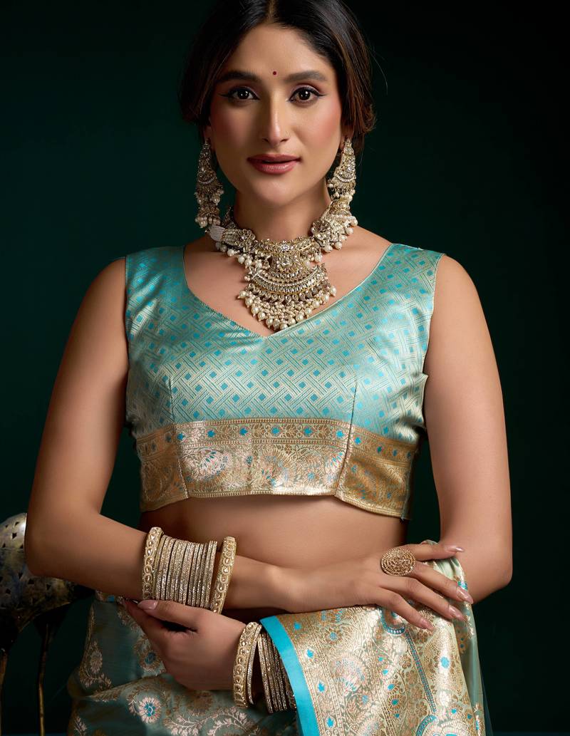Women's turquoise satin silk zari woven saree with blouse