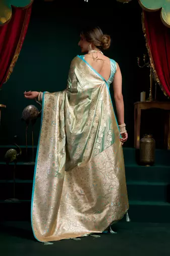 Women's turquoise satin silk zari woven saree with blouse