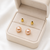 Pink freshwater pearl stud earrings with gold-tone backs