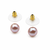 Pink freshwater pearl stud earrings with gold-tone backs pushing