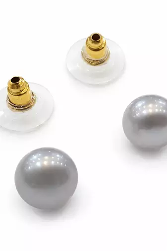 Grey pearl stud earrings with gold-tone backs, round