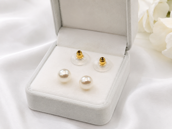 White pearl stud earrings with gold-tone push back clasps 1