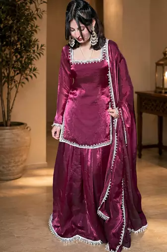 Women floral embroidered regular sequinned fendy satin kurta with sharara & with dupatta