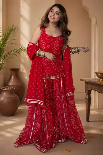 Women bandhani embroidered regular sequinned georgette silk kurta with sharara & with dupatta