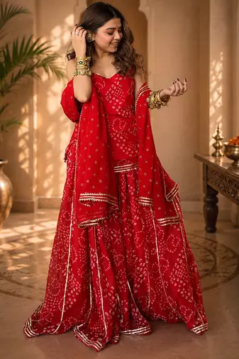 Women bandhani embroidered regular sequinned georgette silk kurta with sharara & with dupatta