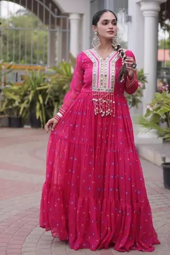 Rani-pink georgette readymade navratri anarkali suit with laheriya & kutchi patchework