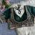 Green heavy embroidered silk blend bridal blouse