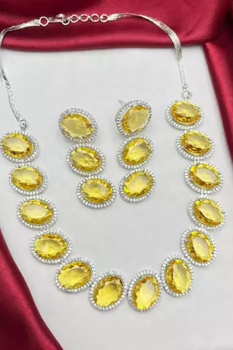 vibrant canary yellow oval crystal necklace earring set | silver plated bridal statement jewellery