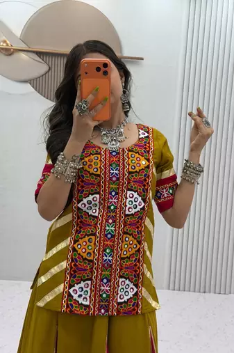 NAVRATRI WEAR GREEN COLOR COTTON FLARED LEHENGA WITH COTTON KEDIYA TOP FULL STITCHED.