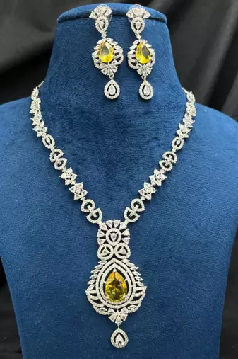 yellow stone bridal necklace earrings set | silver cz wedding jewellery | indian party wear statement