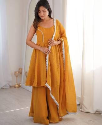 yellow silk blend  readymade suit with zarkhand & lace work 1