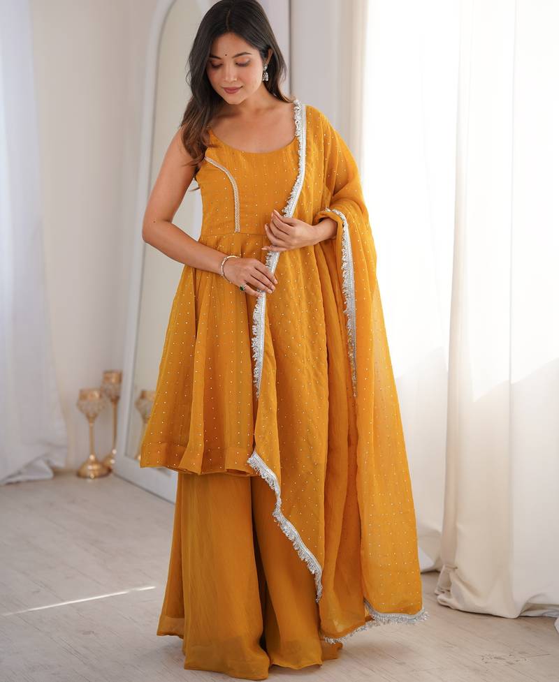 yellow silk blend  readymade suit with zarkhand & lace work