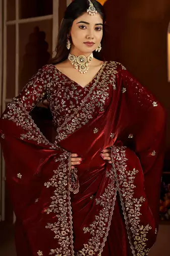 Maroon jimmy choo zari butti work embellished wedding wear saree
