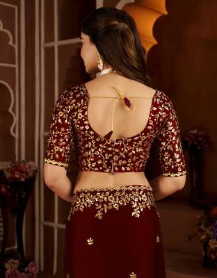 Maroon jimmy choo zari butti work embellished wedding wear saree 4