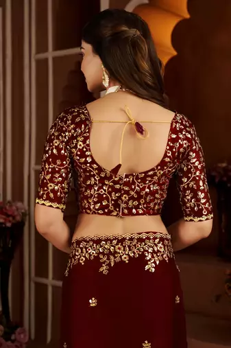 Maroon jimmy choo zari butti work embellished wedding wear saree