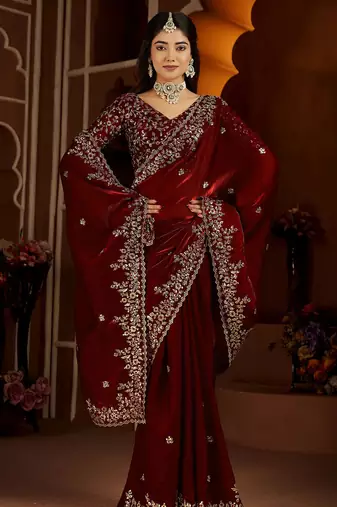 Maroon jimmy choo zari butti work embellished wedding wear saree