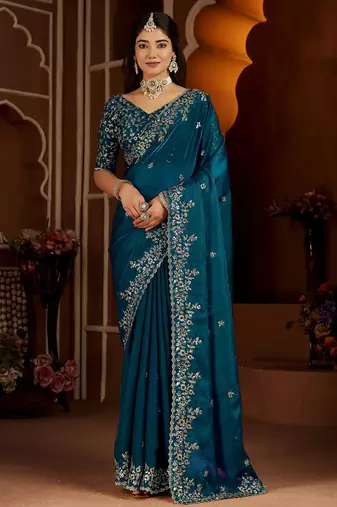 Blue jimmy choo zari butti work embellished wedding wear saree