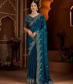 Blue jimmy choo zari butti work embellished wedding wear saree